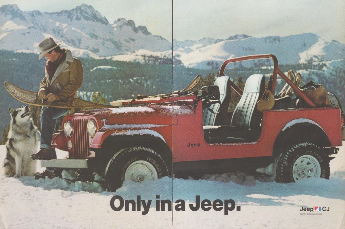 Vintage 1970s Jeep CJ original print advertisement, red open-top CJ in snowy mountain setting with cowboy and husky dog, 'Only in a Jeep' campaign