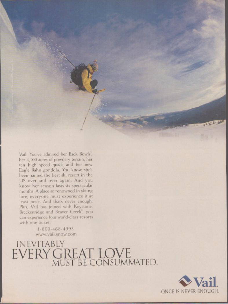 Vintage 1990s Vail ski resort original print advertisement, skier in yellow jacket carving deep powder in Vail's Back Bowls with Rocky Mountain panorama below