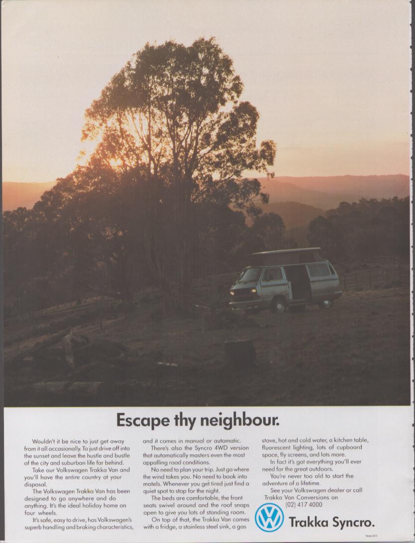 Vintage 1980s Volkswagen Trakka Syncro original print advertisement, VW camper van parked at sunset on a rocky Australian hillside beneath a silhouetted eucalyptus tree