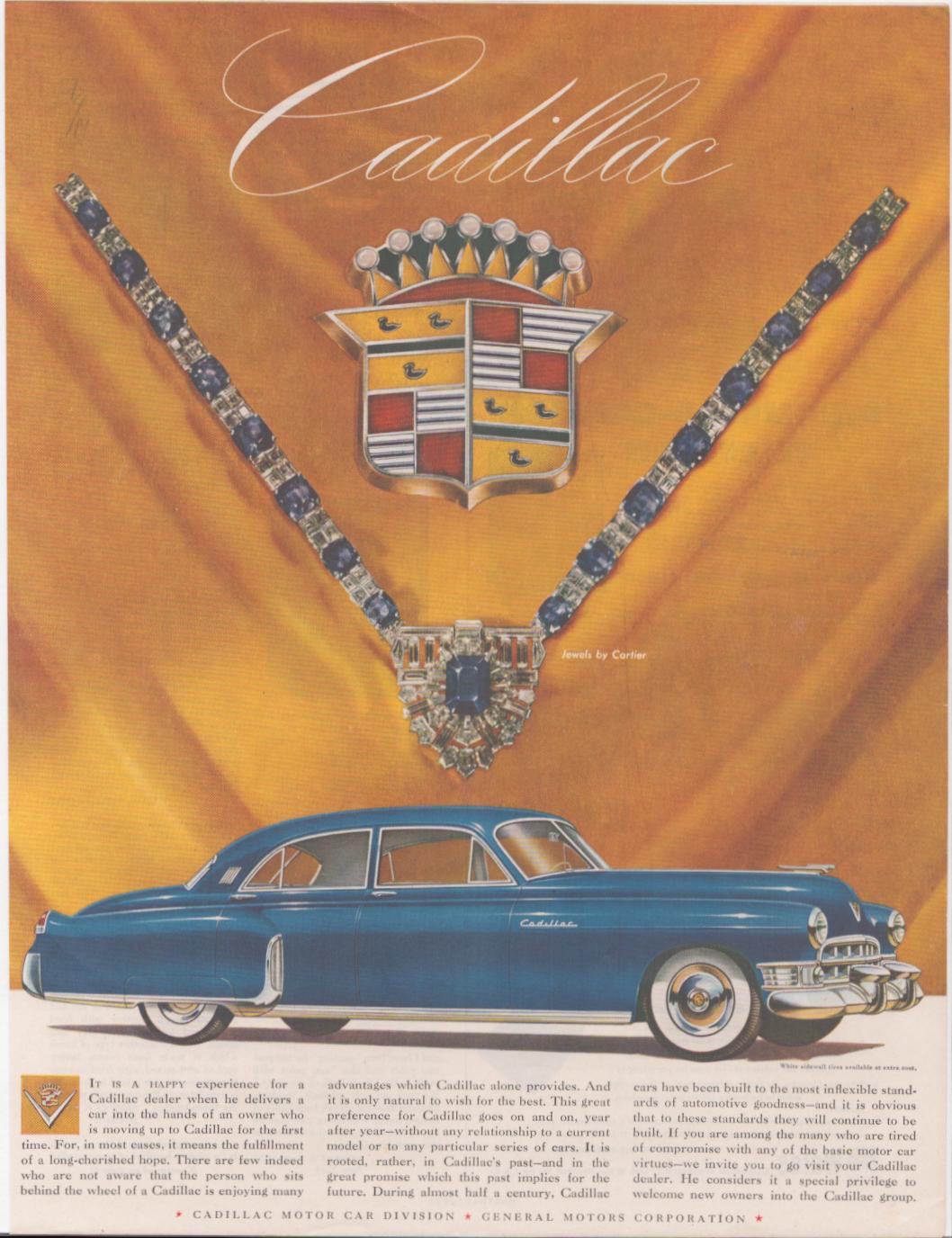 Vintage 1950 Cadillac original print advertisement, blue Fleetwood sedan beneath a Cartier sapphire necklace draped over the Cadillac crest on a golden silk background