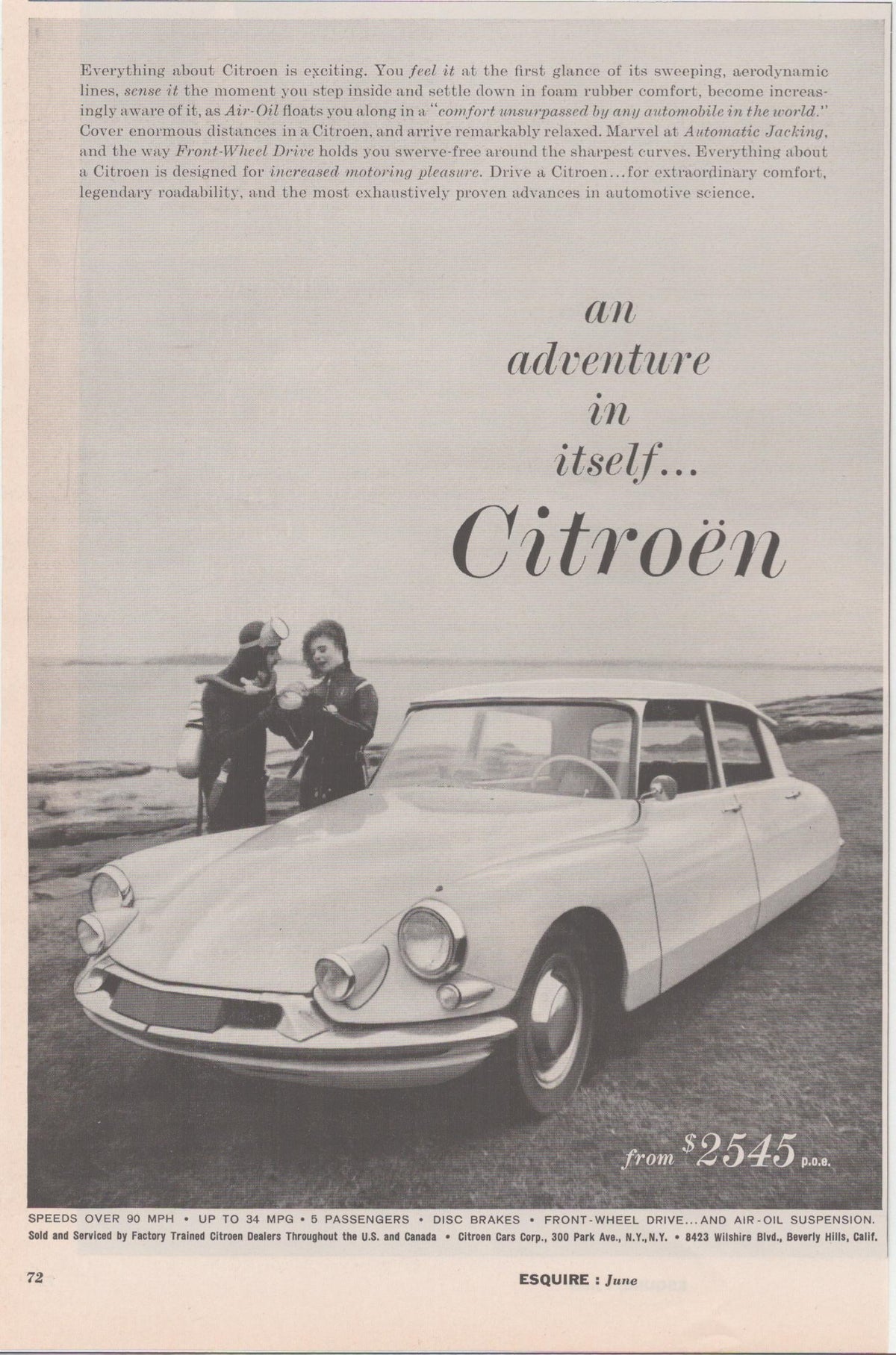 Vintage 1960s Citroën DS original print advertisement, black and white photo of the aerodynamic DS sedan parked on a coastal rocky shore with two figures standing beside it