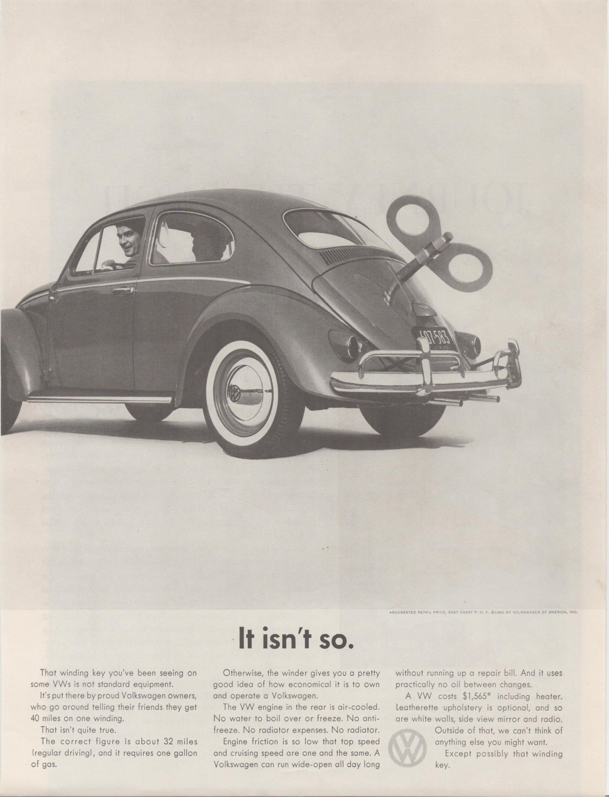 Vintage 1961 Volkswagen Beetle original print advertisement, black and white rear three-quarter view of VW Bug with oversized wind-up key on engine lid, headline reads 'It isn't so.'