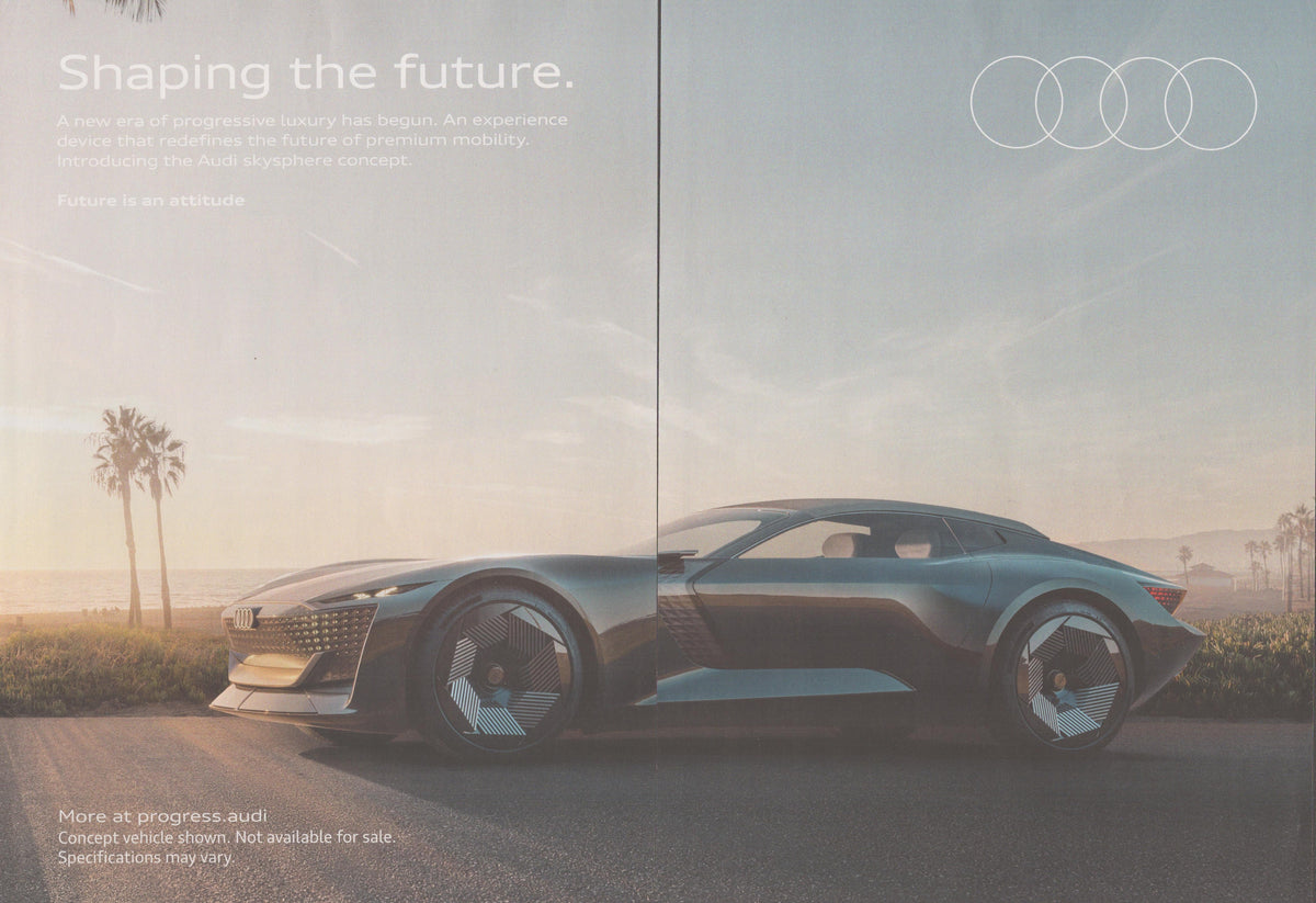 Vintage 2022 Audi Skysphere Concept original print advertisement, two-page spread showing futuristic electric grand tourer in profile against a golden-hour California landscape with palm trees