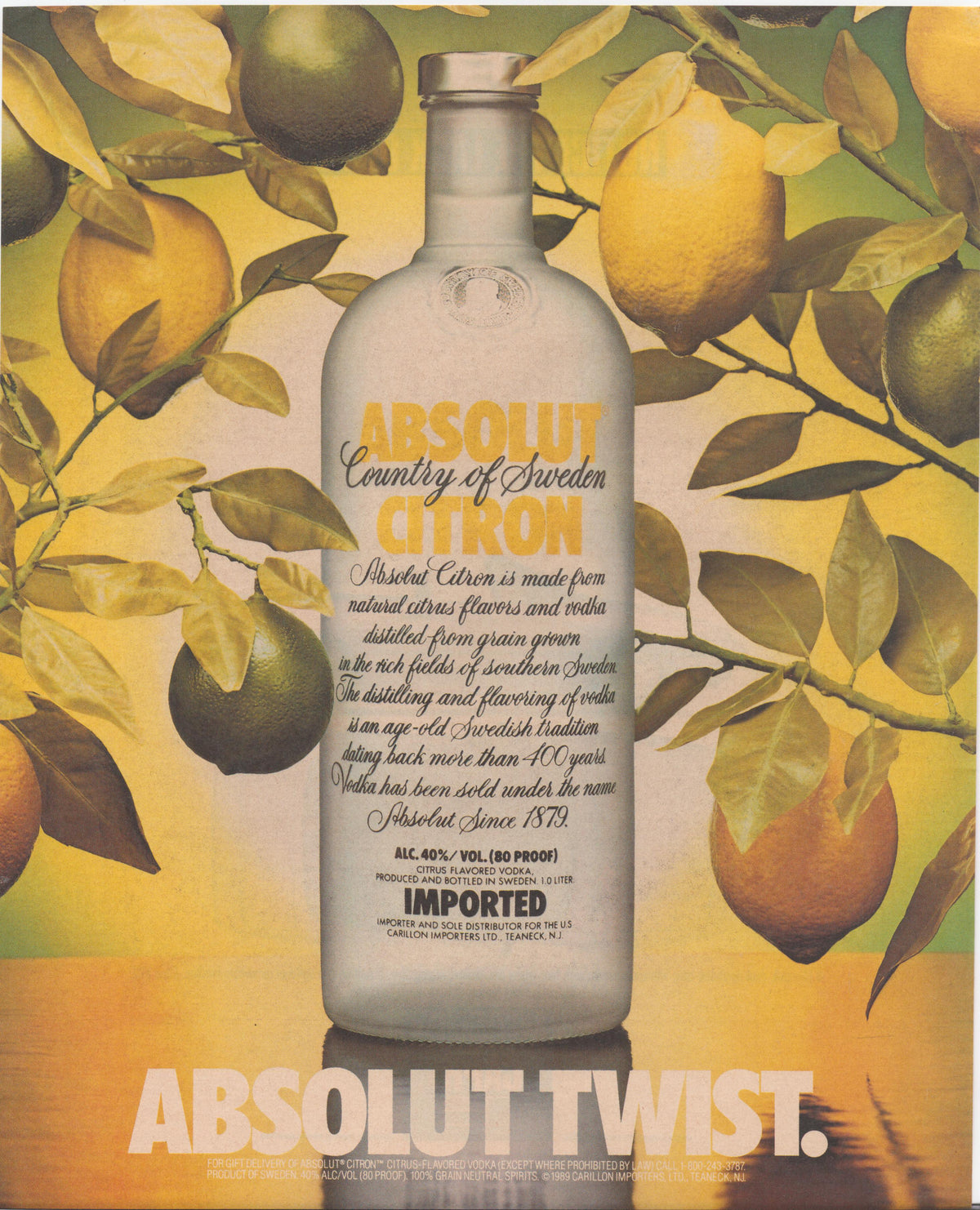 Vintage 1988 Absolut Citron original print advertisement, frosted vodka bottle surrounded by lemons and limes on tree branches with 'Absolut Twist' tagline