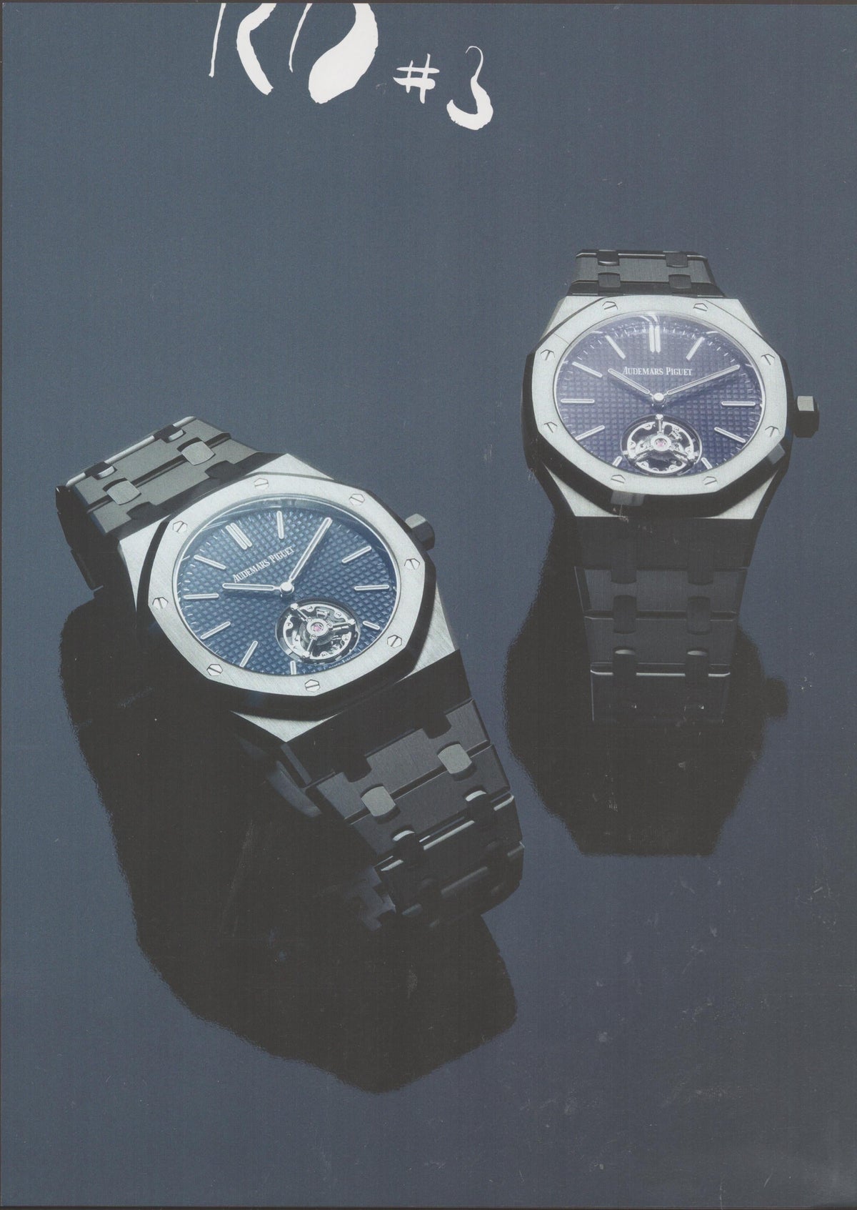 Vintage 1990s Audemars Piguet Royal Oak Tourbillon original print advertisement, two blue-dial Royal Oak watches with integrated bracelets reflected on grey surface