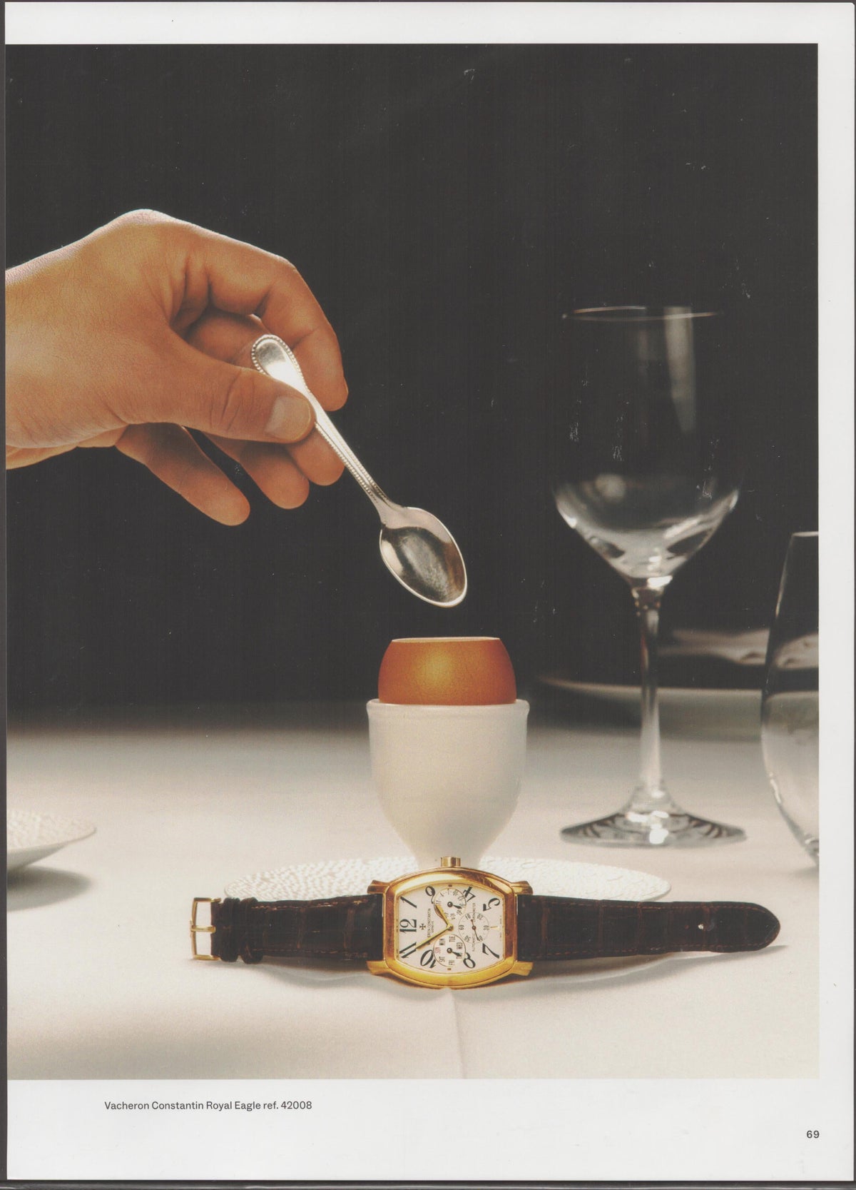 Vintage 2000s Vacheron Constantin Royal Eagle Ref. 42008 original print advertisement, gold watch on white tablecloth beside soft-boiled egg and crystal wine glass