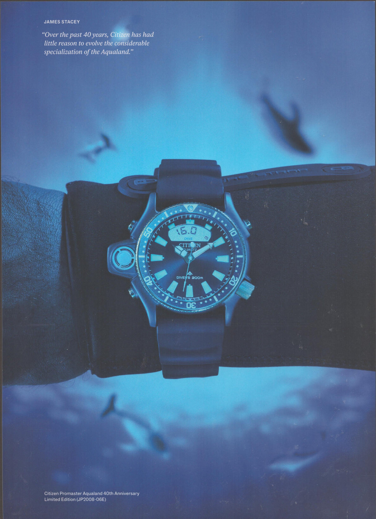Vintage Citizen Promaster Aqualand 40th Anniversary original print advertisement, close-up of dive watch on gloved wrist against deep blue underwater background with fish silhouettes