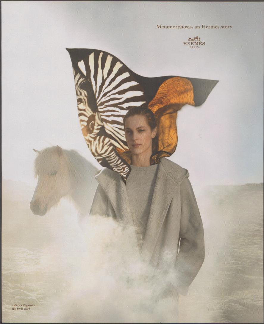 Vintage 1990s Hermès Paris 'Zebra Pegasus' silk twill scarf original print advertisement, model holding billowing zebra-motif scarf with white horse emerging from mist