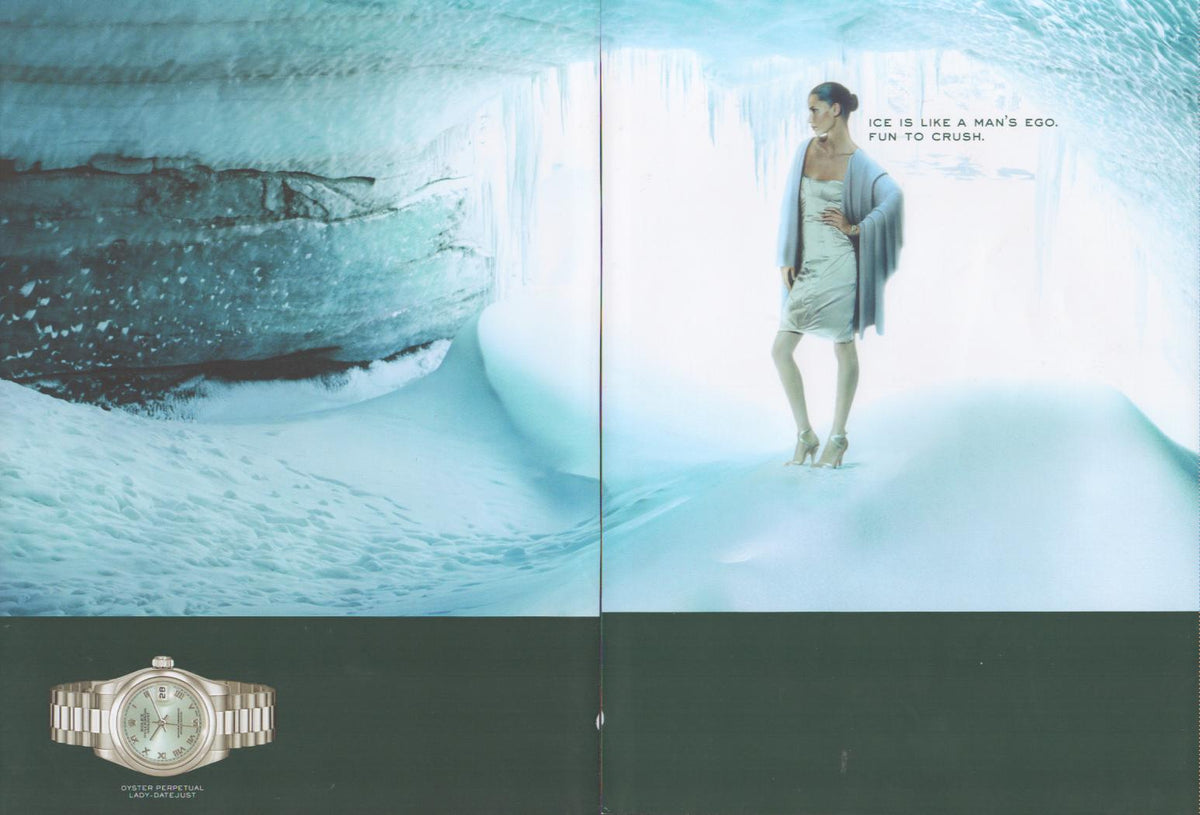 Vintage 2000s Rolex Lady-Datejust Oyster Perpetual original print advertisement, fashion model standing in glacial ice cave with witty headline 'Ice is like a man's ego. Fun to crush.'