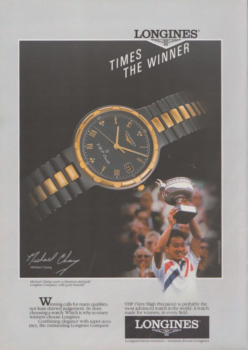 Vintage 1989 Longines Conquest VHP original print advertisement, Michael Chang raising French Open trophy with titanium and gold Longines watch in foreground