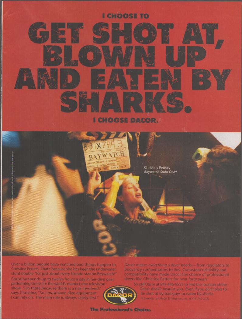 Vintage 1997 Dacor scuba gear original print advertisement, Christina Fetters Baywatch stunt diver on set with clapperboard, bold red headline reading 'Get Shot At, Blown Up and Eaten by Sharks'