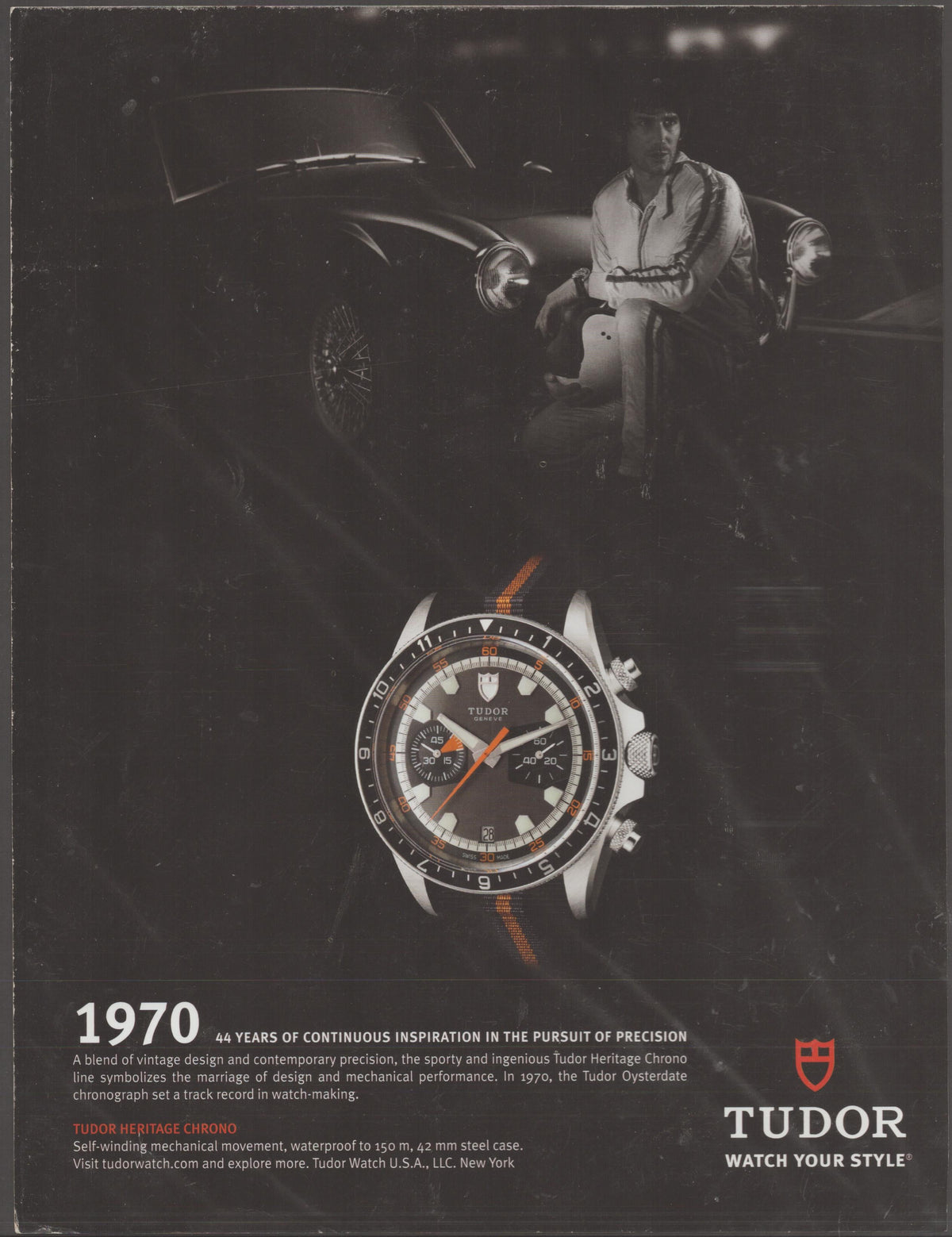 Vintage 2014 Tudor Heritage Chrono original print advertisement, black-and-white image of driver beside classic sports car with orange-accented chronograph watch
