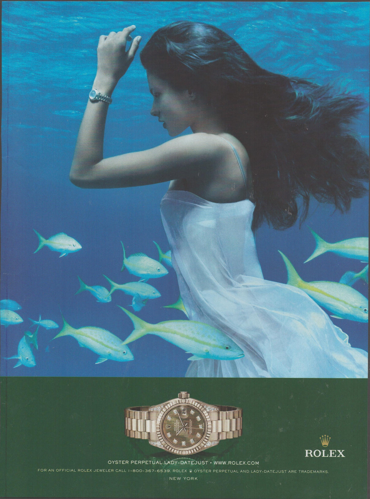 Vintage 2000s Rolex Oyster Perpetual Lady-Datejust original print advertisement, woman in white dress floating underwater surrounded by tropical fish