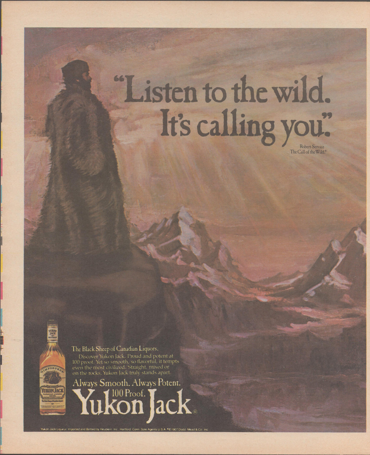 Vintage 1977 Yukon Jack Canadian liqueur original print advertisement, fur-cloaked frontiersman overlooking mountain wilderness at dusk with Robert Service quote