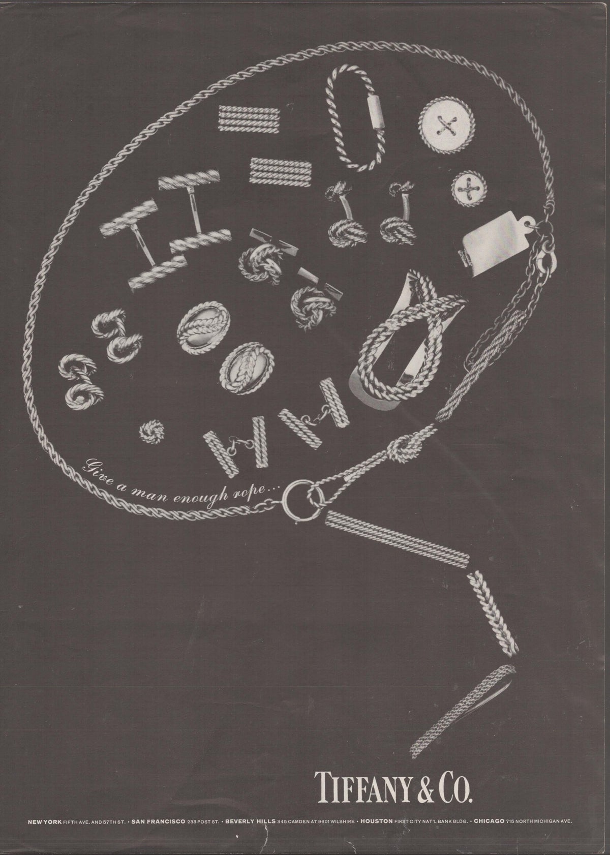 Vintage 1970s Tiffany &amp; Co. original print advertisement, black background with illustrated rope-motif men's jewelry including cufflinks, tie bars, and bracelets arranged in a circular layout