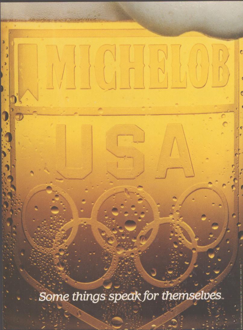 Vintage 1984 Michelob USA Olympics original print advertisement, golden condensation-covered beer glass embossed with Olympic rings and USA shield