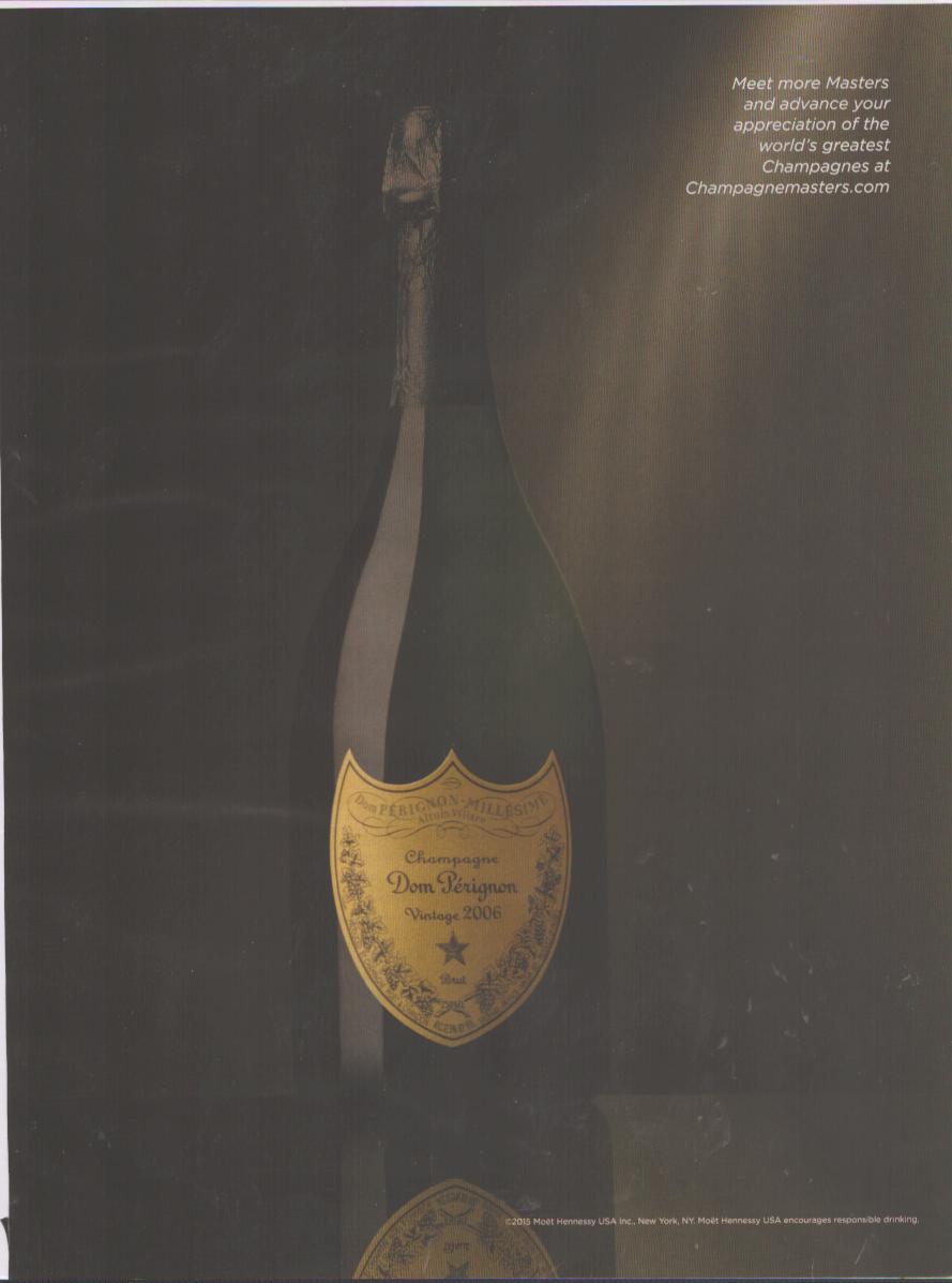 Vintage 2015 Dom Pérignon Vintage 2006 original print advertisement, dramatic dark background with gold label champagne bottle in shadow
