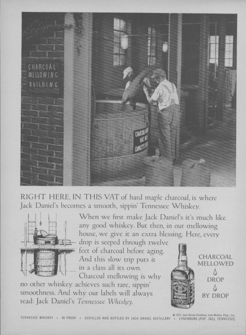 Vintage 1972 Jack Daniel's Tennessee Whiskey original print advertisement, black and white photo of two workers at charcoal mellowing vat inside the Lynchburg distillery