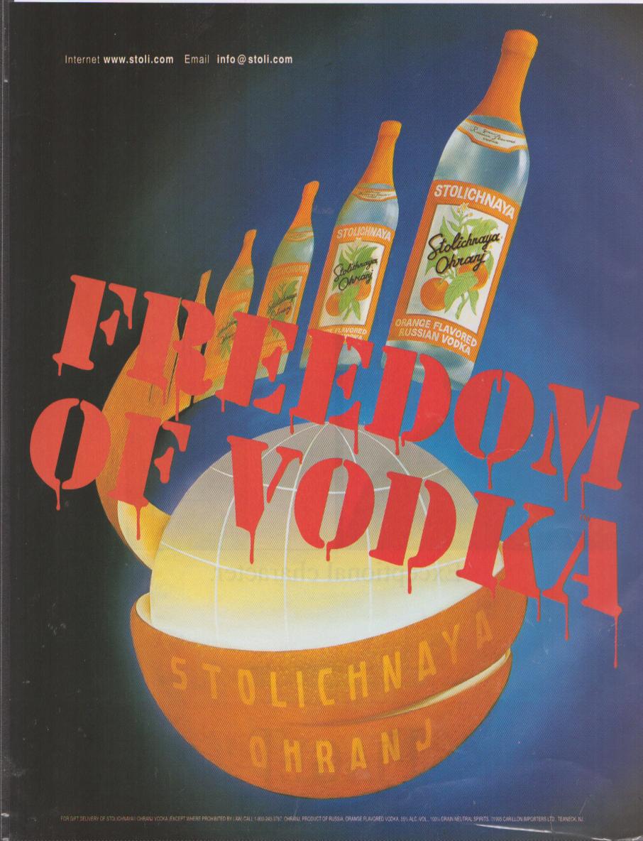 Vintage 1990s Stolichnaya Ohranj original print advertisement, bold graffiti-style 'Freedom of Vodka' text over multiple bottles rising from a halved orange globe on dark background