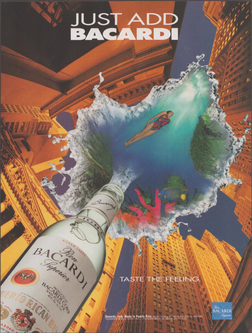 Vintage 1990s Bacardi Superior Rum original print advertisement, surrealist worm's-eye city view with bottle erupting into tropical underwater paradise