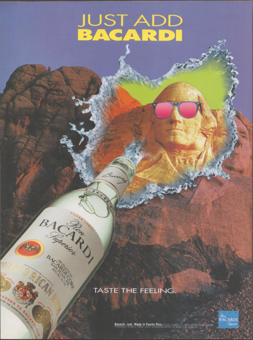 Vintage 1990s Bacardi Superior Rum original print advertisement, Bacardi bottle splashing liquid over Mount Rushmore with George Washington wearing pink sunglasses, purple sky background
