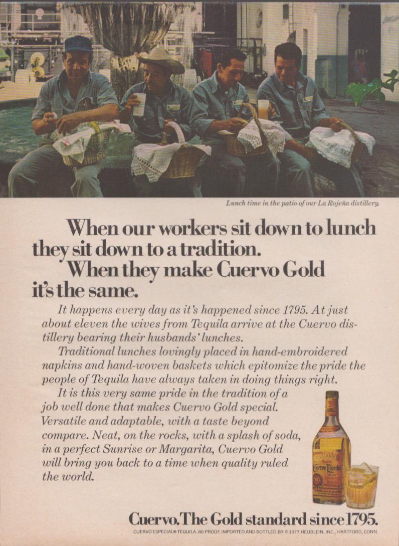 Vintage 1977 Jose Cuervo Gold Tequila original print advertisement, workers eating lunch at La Rojeña distillery patio with bottle and glass inset
