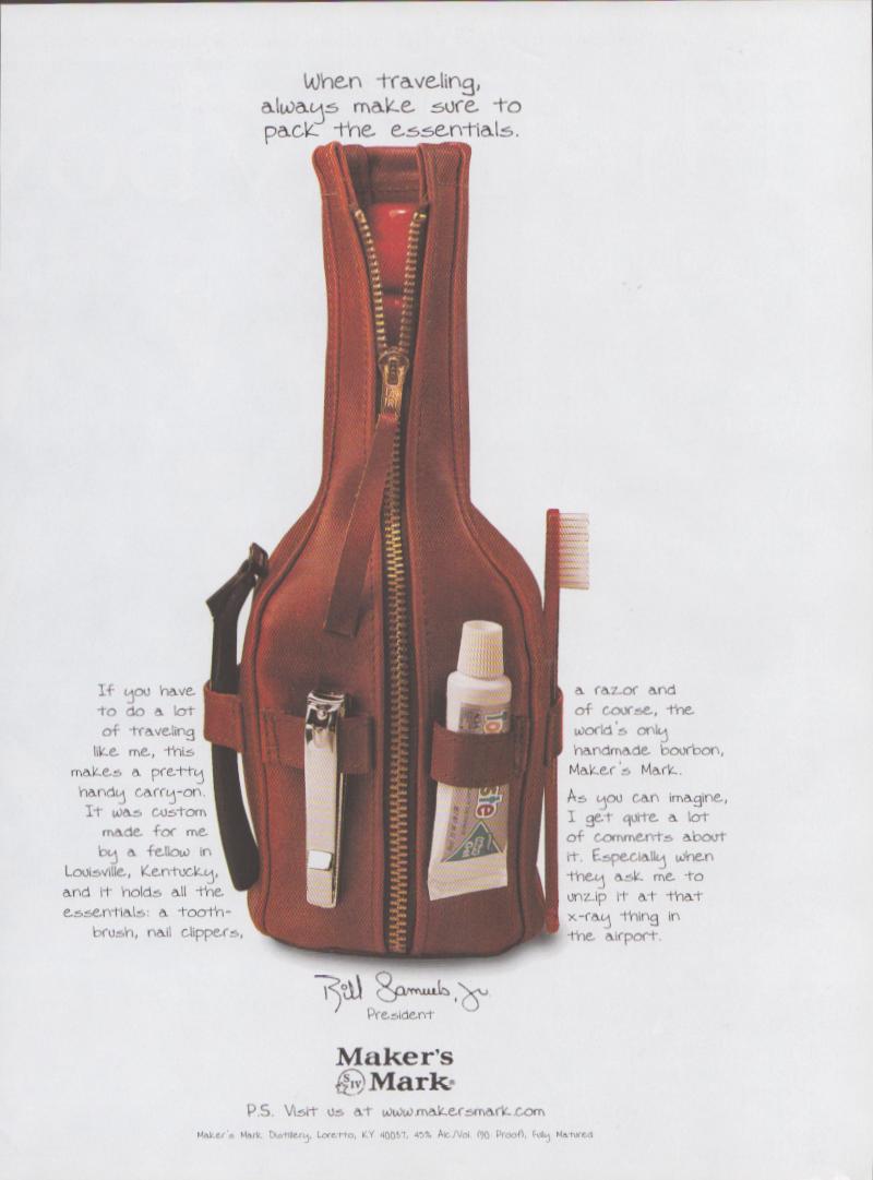 Vintage 1990s Maker's Mark bourbon original print advertisement, bottle-shaped red travel dopp kit with toothbrush, nail clippers and razor packed as travel essentials