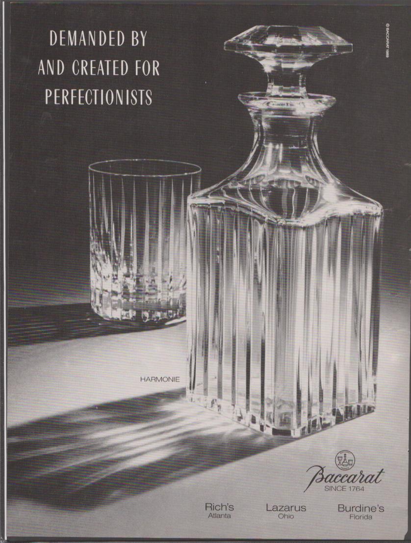 Vintage 1985 Baccarat Harmonie original print advertisement, black and white dramatic studio photograph of faceted crystal decanter and tumbler casting geometric shadows