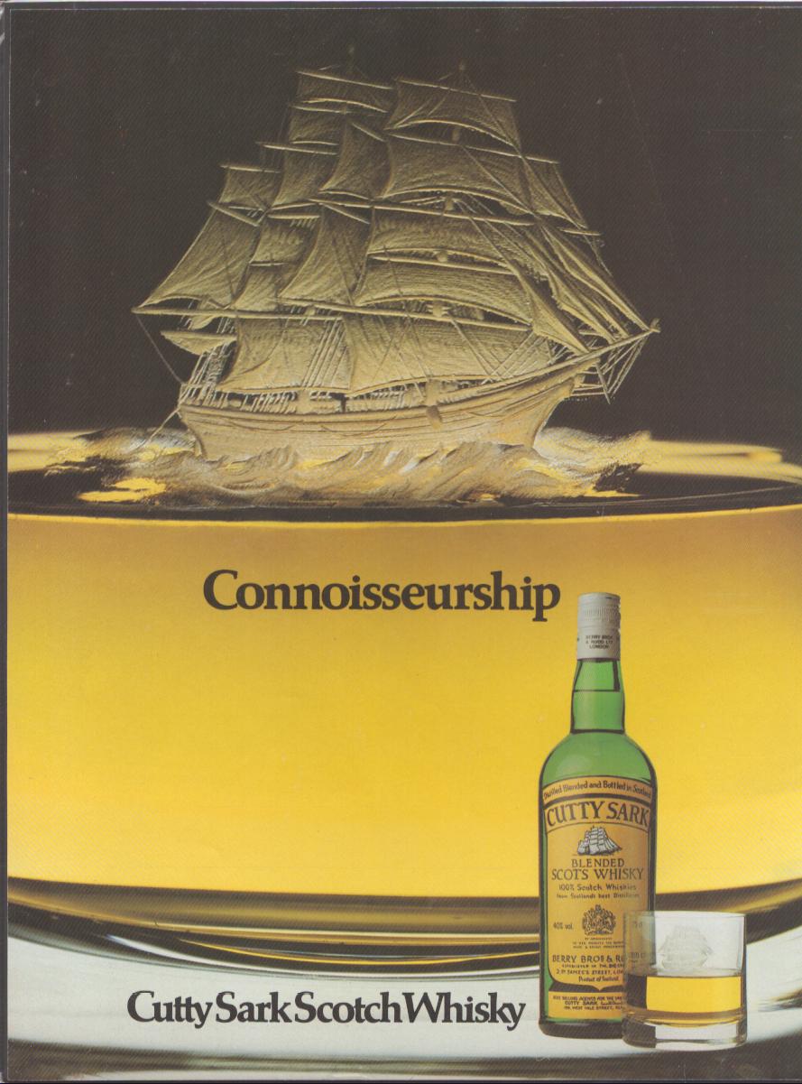 Vintage 1970s Cutty Sark Scotch Whisky original print advertisement, dramatic golden background with engraved clipper ship emerging from whisky glass and bottle with rocks glass below