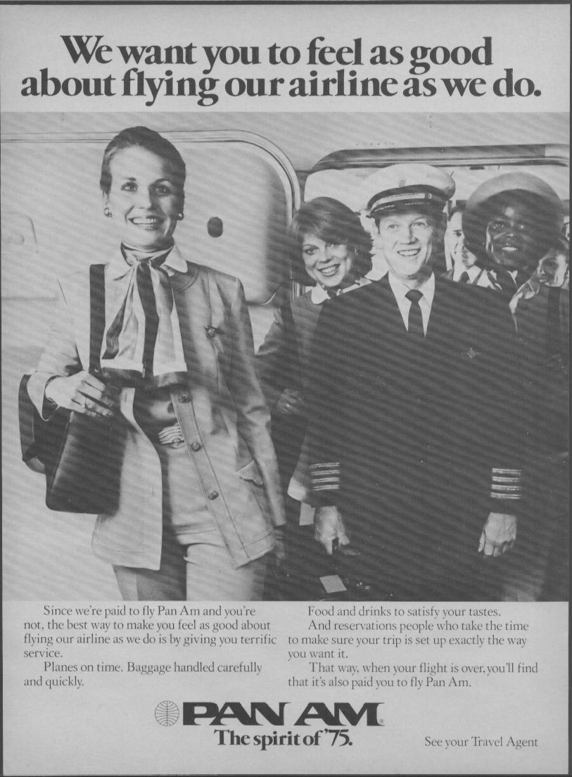 Vintage 1975 Pan Am original print advertisement, black and white photo of smiling Pan Am flight crew including captain and stewardesses posed at aircraft door with Spirit of 75 tagline