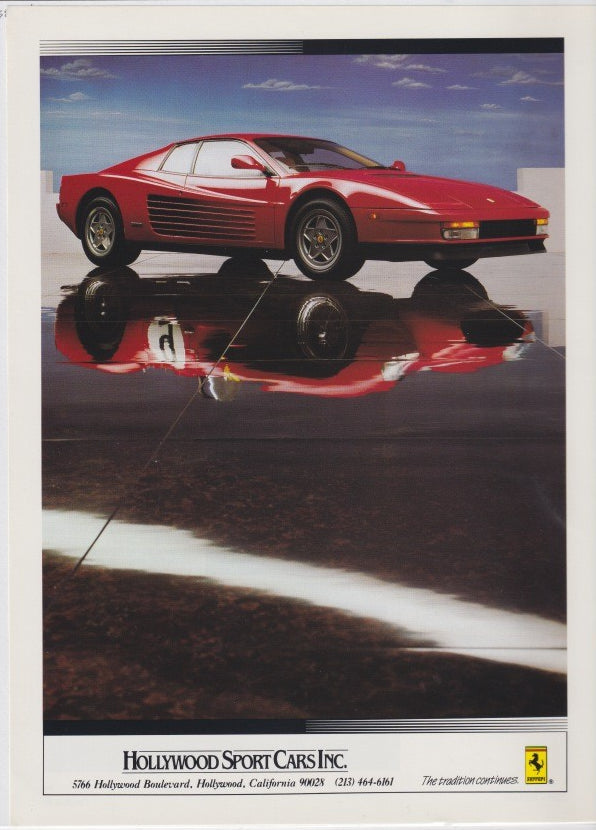 Vintage 1980s Ferrari Testarossa original print advertisement, red supercar with distinctive side strakes reflected on wet surface