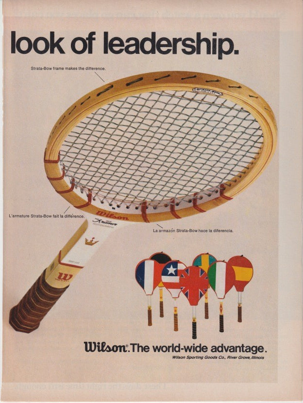 Vintage 1970s Wilson Kramer tennis racket original print advertisement, featuring Strata-Bow wooden racket and international flag mini rackets with 'look of leadership' headline