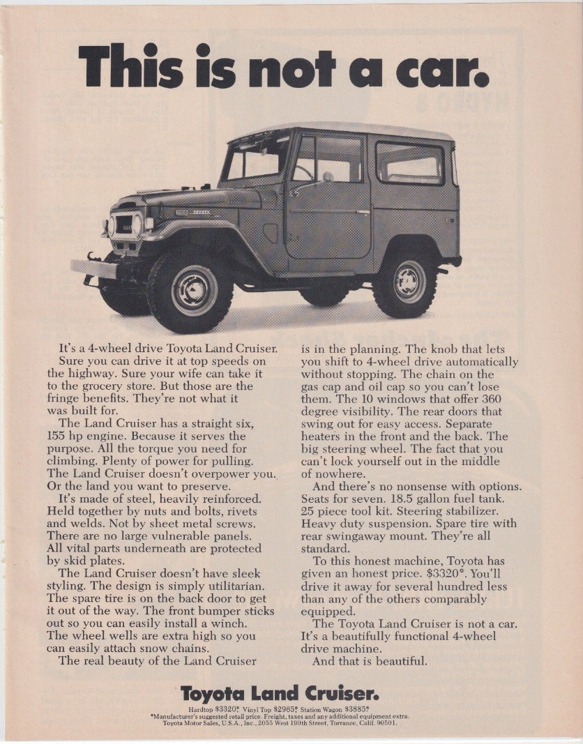 Vintage 1960s Toyota Land Cruiser FJ40 original print advertisement, black and white image of FJ40 hardtop with bold 'This is not a car' headline