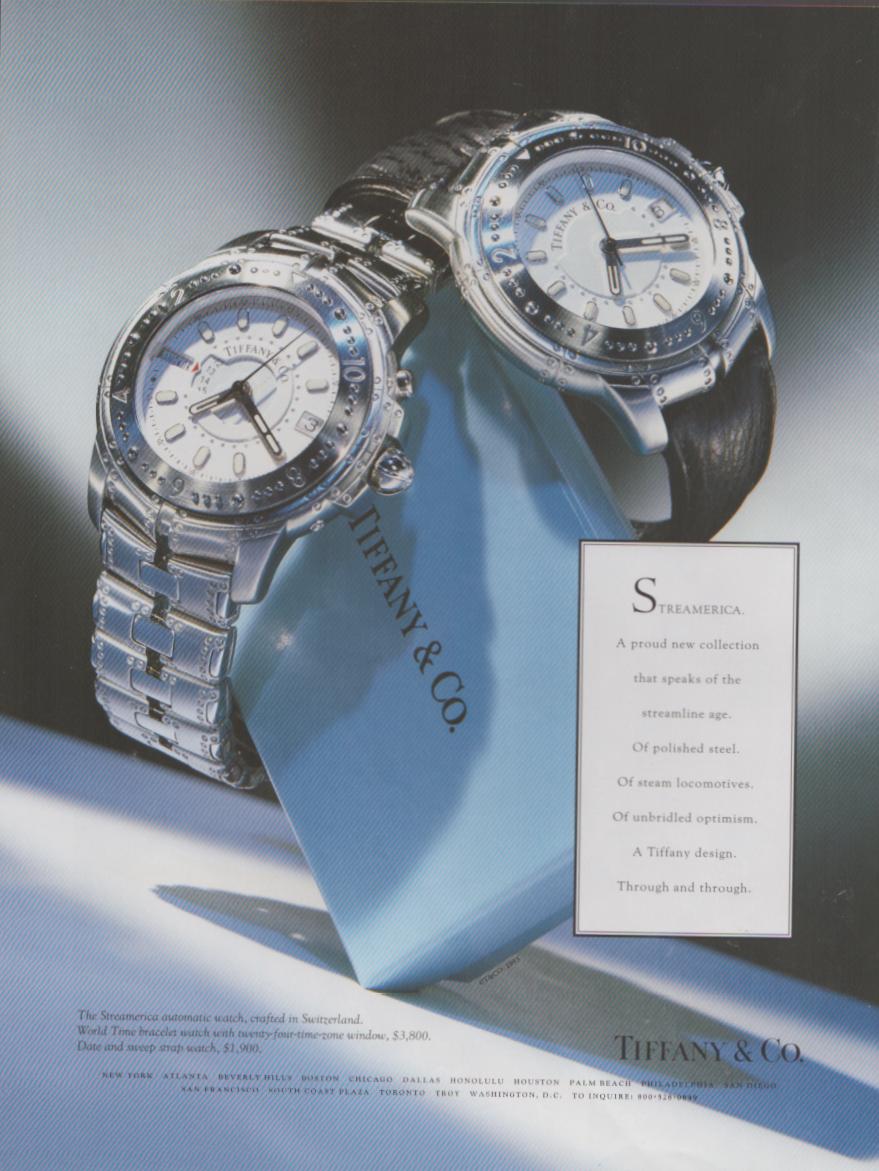 Vintage 1990s Tiffany & Co. Streamerica original print advertisement, two stainless steel watches displayed with iconic Tiffany blue box on silver background