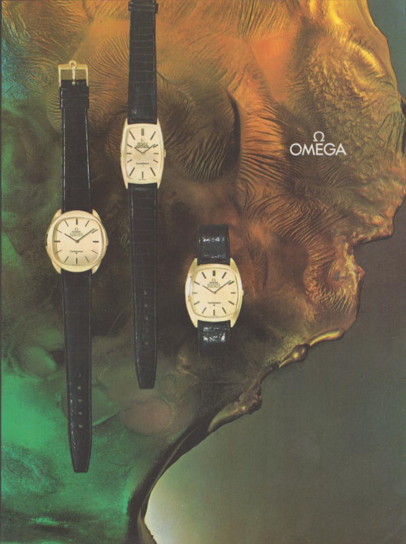 Vintage 1973 Omega Constellation original print advertisement, three cushion-case gold watches with black leather straps displayed against a surreal golden abstract background