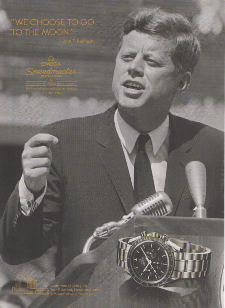 Vintage Omega Speedmaster Professional original print advertisement, black and white photo of President John F. Kennedy speaking at a podium with the Speedmaster watch and 'We Choose to Go to the Moon' quote in gold text