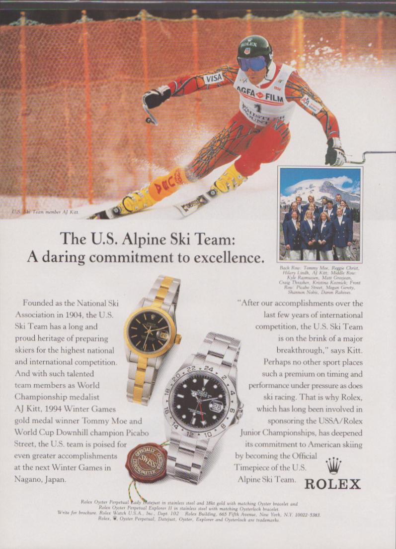 Vintage 1997 Rolex Explorer II original print advertisement, AJ Kitt racing downhill with Rolex Explorer II and Datejust watches displayed below alongside U.S. Ski Team portrait