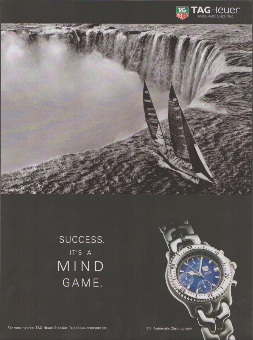 Vintage 1990s TAG Heuer S/el Automatic Chronograph original print advertisement, two racing sailboats near waterfall edge with blue dial watch and 'Success. It's A Mind Game.' tagline