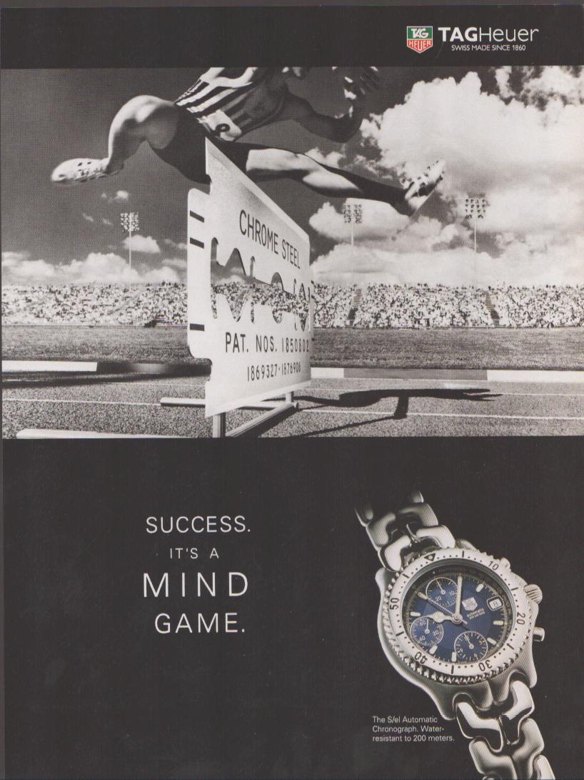 Vintage 1990s TAG Heuer S/el Automatic Chronograph original print advertisement, black and white hurdler clearing chrome steel barrier in stadium with blue-dial watch below