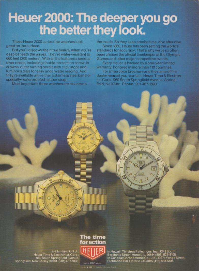 Vintage 1983 Heuer 2000 original print advertisement, three dive watches displayed against white coral underwater background with blue water