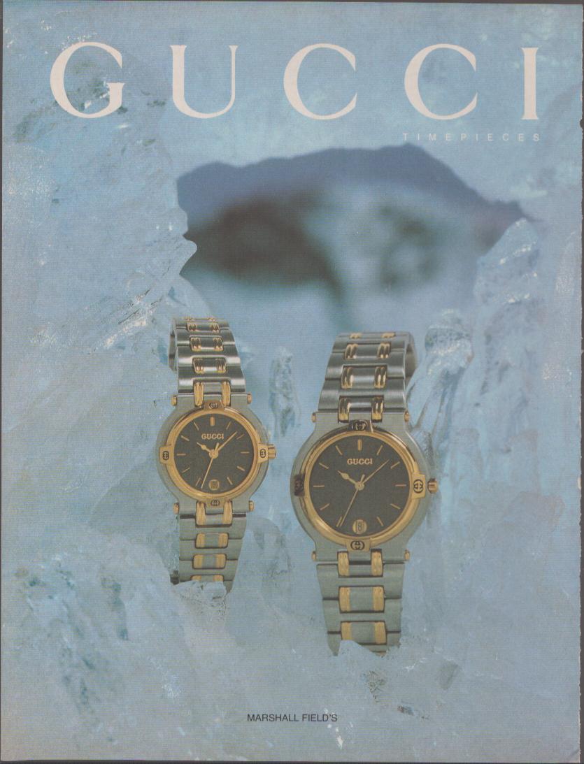 Vintage 1980s Gucci Timepieces original print advertisement, two two-tone gold and steel dress watches displayed against glacial blue ice background with bold Gucci logo