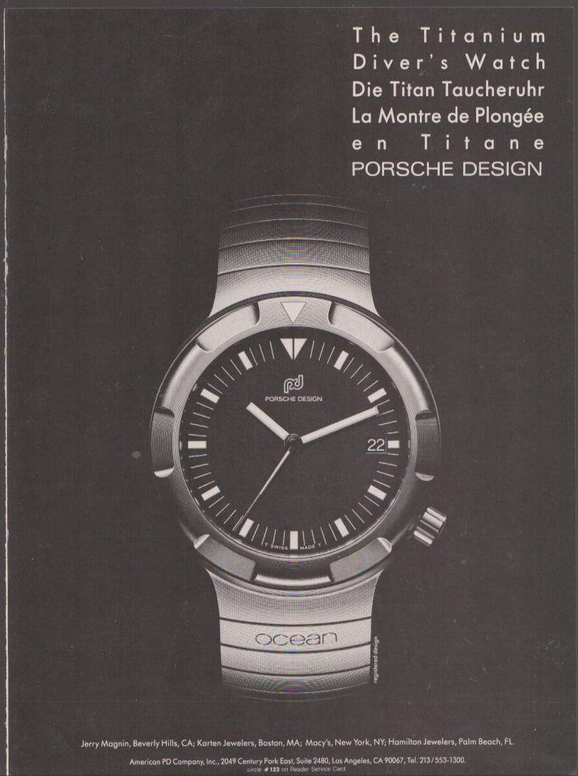 Vintage 1980s Porsche Design Ocean titanium diver's watch original print advertisement, black background with large close-up of round sport watch with black dial and integrated bracelet