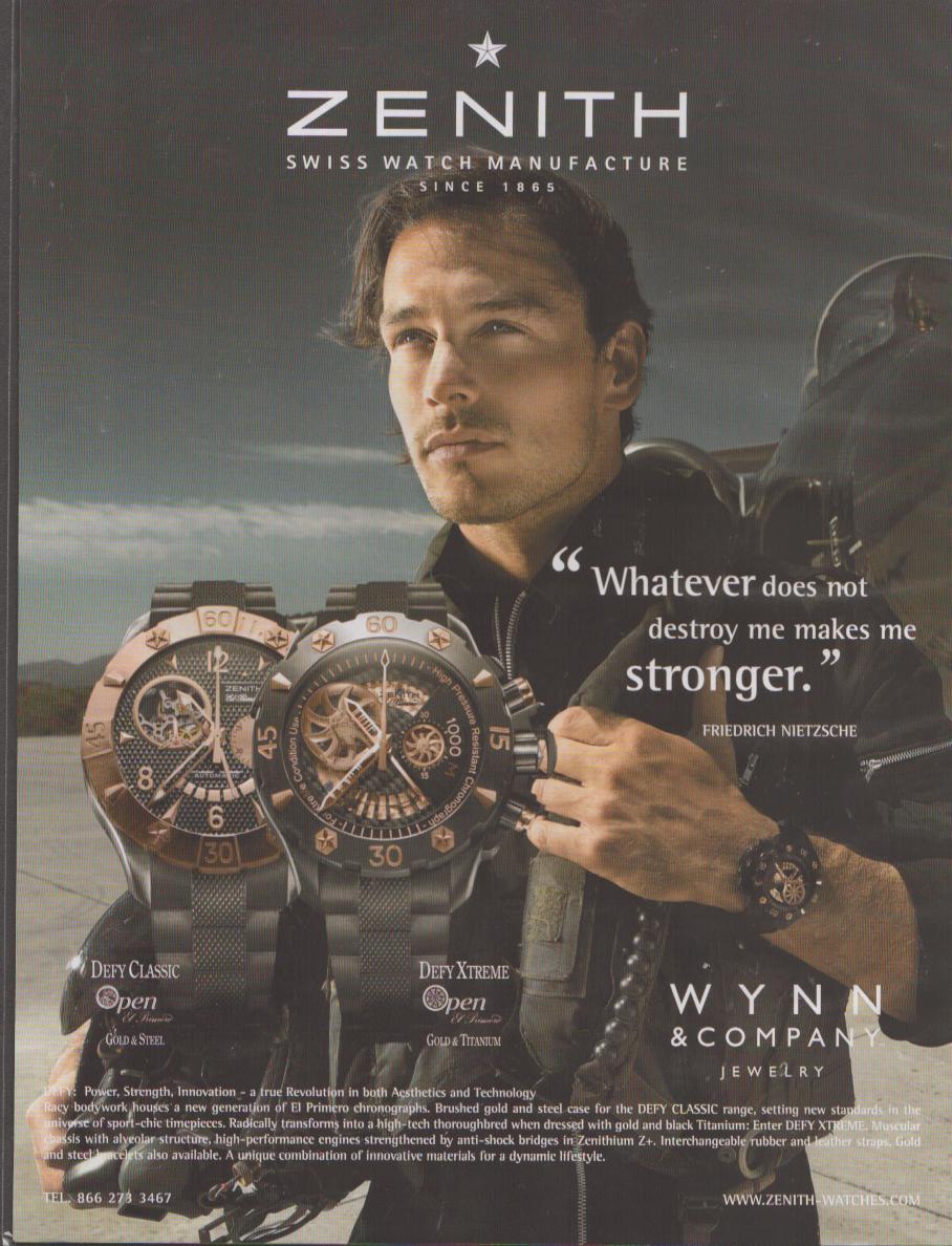 Vintage 2005 Zenith Defy Classic and Defy Xtreme original print advertisement, male model with motorcycle holding chronograph watches with Nietzsche quote