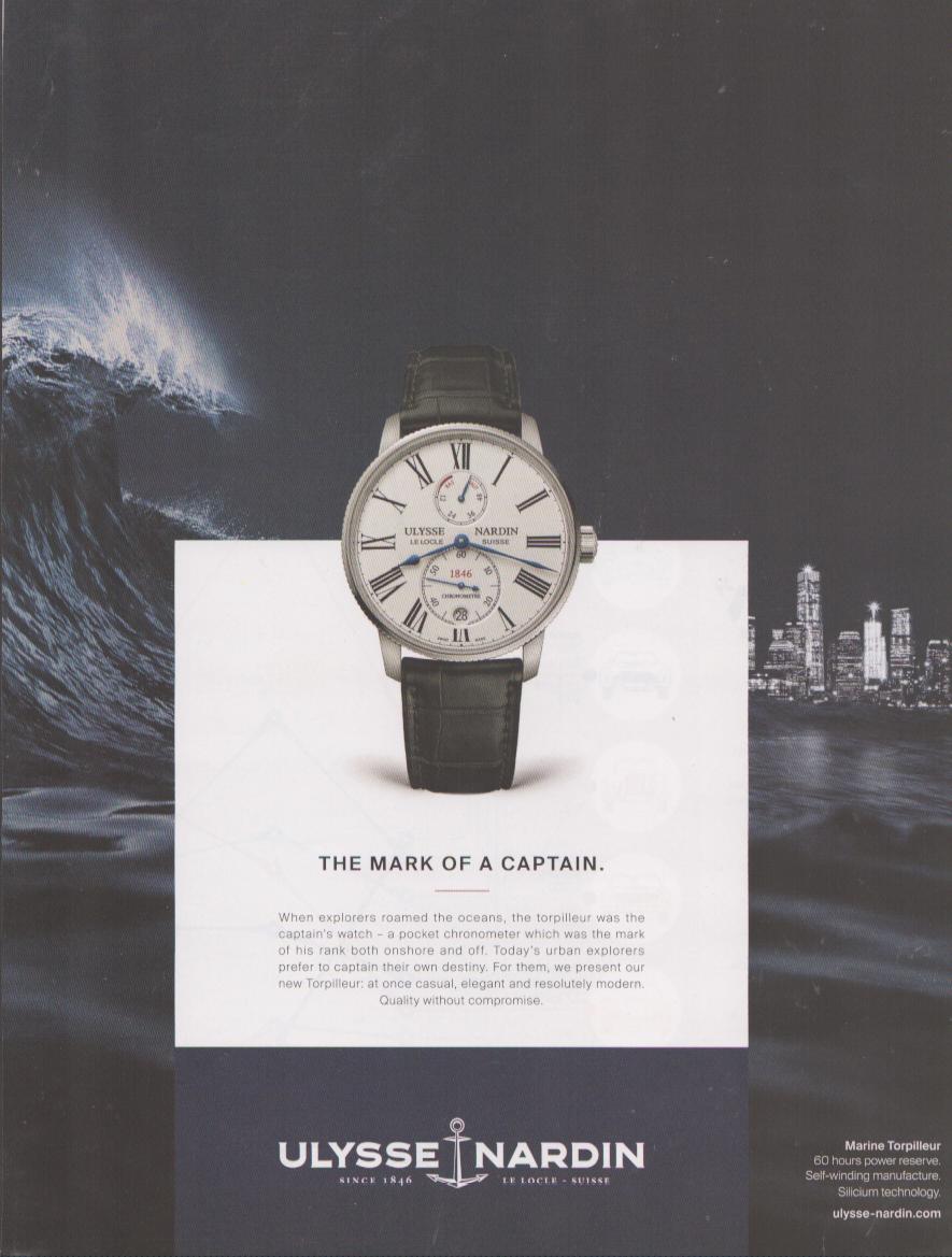 Vintage 2013 Ulysse Nardin Marine Torpilleur original print advertisement, white dial dress watch with dark leather strap against dramatic ocean wave and city skyline background