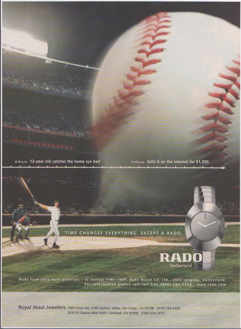 Vintage c. 2001 Rado Switzerland original print advertisement, featuring a dramatic baseball stadium home run scene with a close-up of the ball in flight and a sleek silver Rado watch in the lower right corner