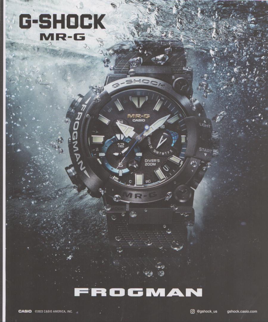 Vintage 2023 Casio G-Shock MR-G Frogman original print advertisement, all-black titanium diver's watch emerging from water with dramatic splash photography