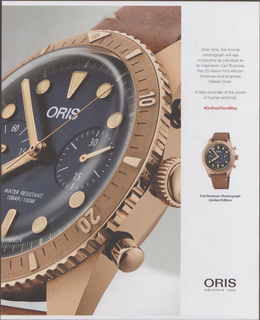 Vintage 2010s Oris Carl Brashear Chronograph Limited Edition original print advertisement, dramatic close-up of bronze dive chronograph with blue dial and tan leather strap