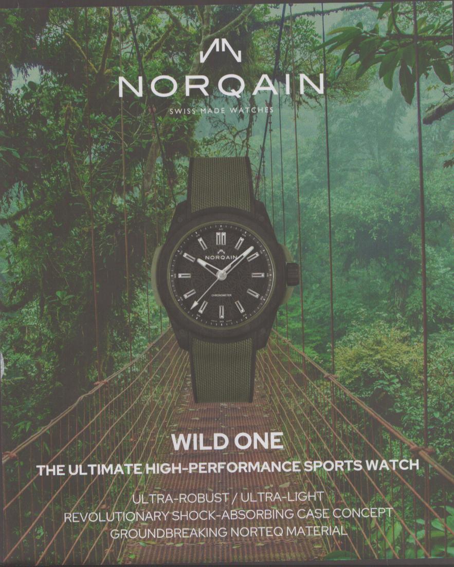 Vintage 2020s Norqain Wild One original print advertisement, black-cased sports watch with olive strap suspended over a misty jungle rope bridge