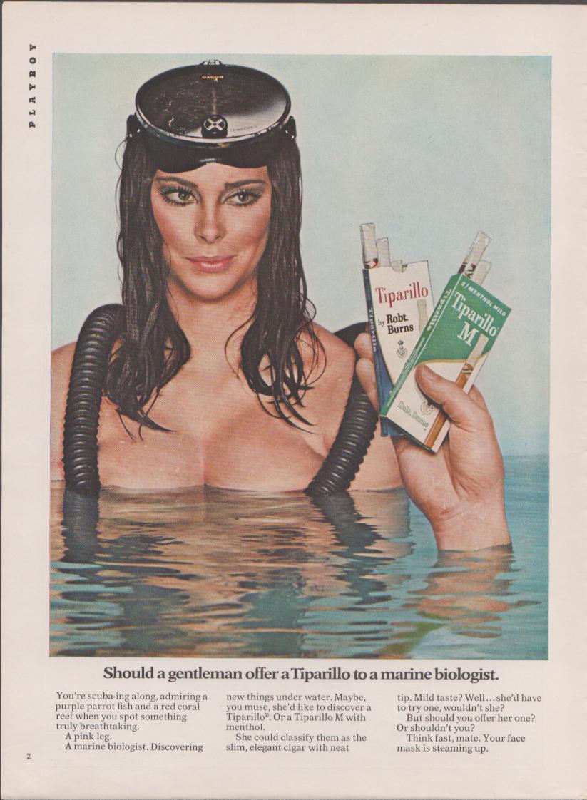 Vintage 1968 Tiparillo cigar original print advertisement, woman in scuba mask emerging from water holding two packs of Tiparillo cigars